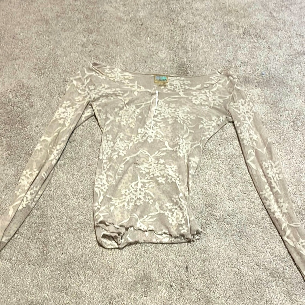 this is one of the rarest piece of clothing i have and is xs but fitting